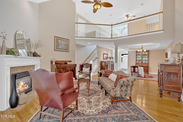 5 Fox Run Ln, Johnson City, TN 37604 - living room with wood finished floors, stairs, a towering ceiling, a ceiling fan, and baseboards