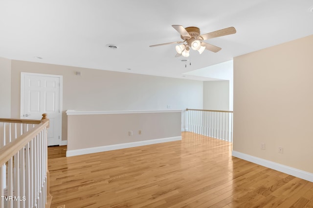 5 Fox Run Ln, Johnson City, TN 37604 - spare room featuring light wood-style flooring, ceiling fan, and baseboards