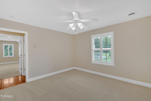 5 Fox Run Ln, Johnson City, TN 37604 - spare room with light colored carpet, healthy amount of natural light, ceiling fan, and baseboards