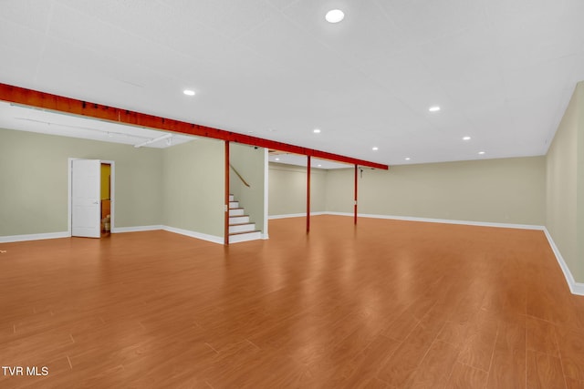 5 Fox Run Ln, Johnson City, TN 37604 - finished below grade area with wood finished floors, baseboards, stairway, and recessed lighting