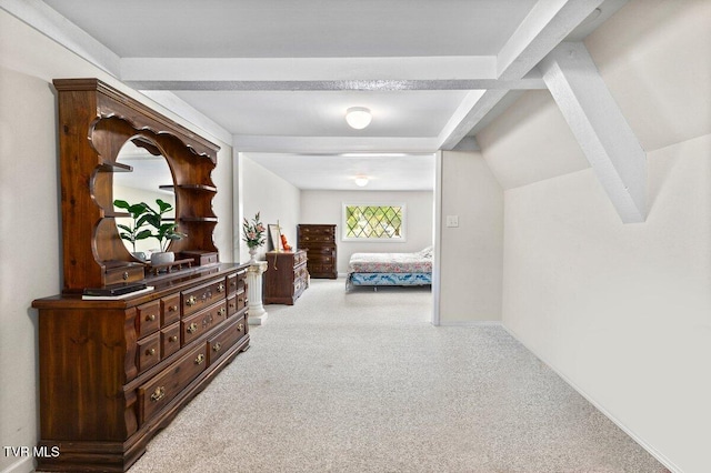 hallway with carpet floors and baseboards