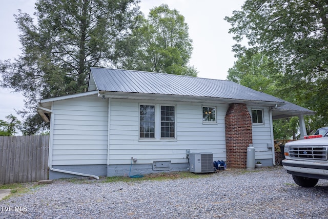 1496 Old State Route 34, Telford, TN 37690 - view of front of house with metal roof, fence, and central AC unit