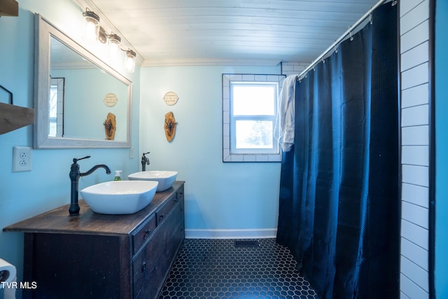 1496 Old State Route 34, Telford, TN 37690 - full bathroom with ornamental molding, baseboards, a shower with curtain, and double vanity