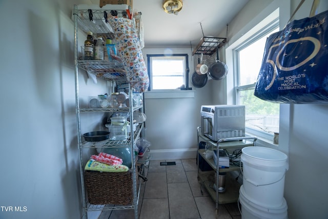 1496 Old State Route 34, Telford, TN 37690 - clothes washing area featuring tile patterned floors and baseboards