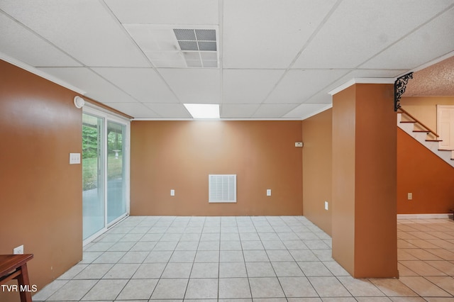 8020 Rock Switch Rd, Wise, VA 24293 - unfurnished room with a paneled ceiling, light tile patterned floors, stairs, and ornamental molding