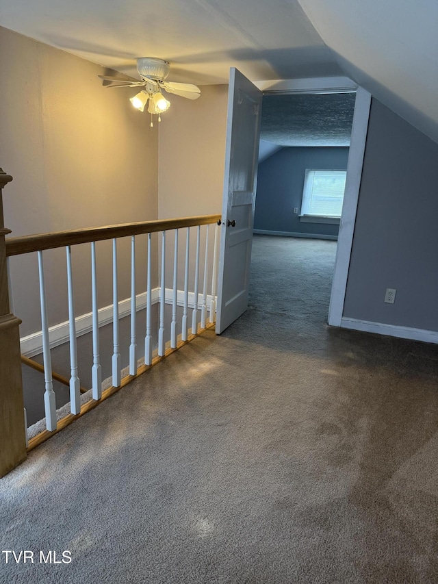 379 SW Oakland St, Abingdon, VA 24210 - stairway with carpet, ceiling fan, baseboards, and vaulted ceiling