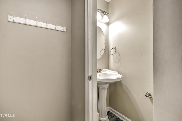 bathroom featuring baseboards