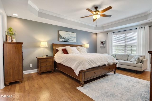 134 Chancery Ct, Piney Flats, TN 37686 - bedroom featuring a raised ceiling, ornamental molding, light wood-style flooring, baseboards, and ceiling fan