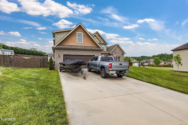 134 Chancery Ct, Piney Flats, TN 37686 - view of front facade featuring driveway, brick siding, and an attached garage