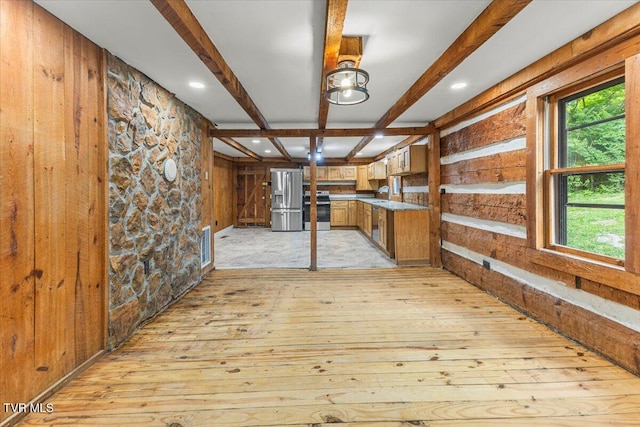2318 Westwood St, Johnson City, TN 37604 - kitchen with appliances with stainless steel finishes, beamed ceiling, light wood-style floors, wooden walls, and recessed lighting