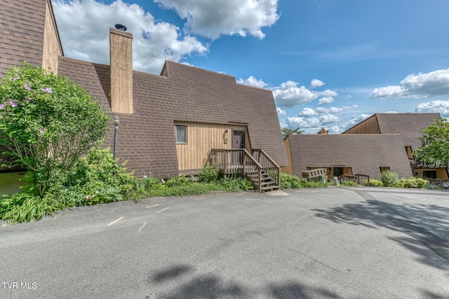 view of front of home with a chimney