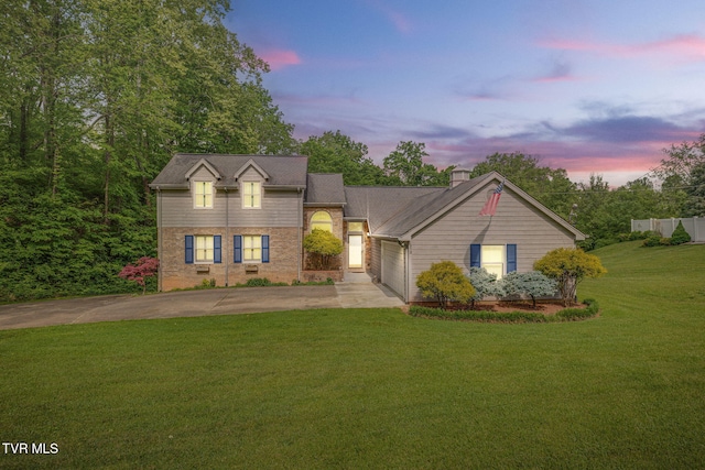 212 Old Castle Rd, Kingsport, TN 37660 - traditional home with concrete driveway, a yard, a garage, a chimney, and brick siding