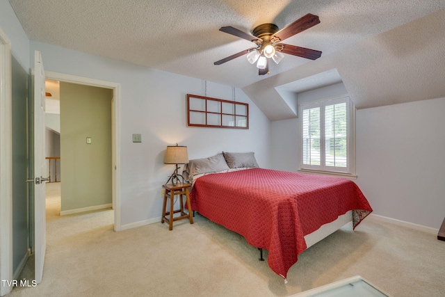 212 Old Castle Rd, Kingsport, TN 37660 - bedroom featuring a textured ceiling, carpet flooring, vaulted ceiling, a ceiling fan, and baseboards