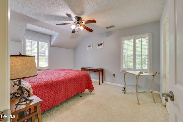 212 Old Castle Rd, Kingsport, TN 37660 - bedroom with carpet flooring, a textured ceiling, a ceiling fan, baseboards, and lofted ceiling