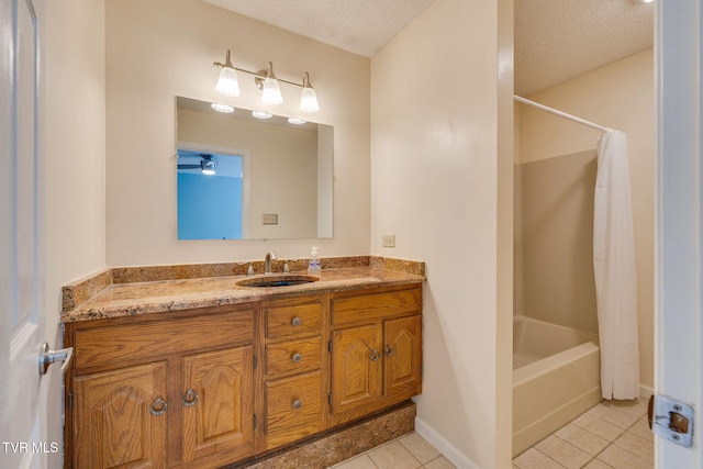 212 Old Castle Rd, Kingsport, TN 37660 - bathroom with tile patterned floors, a textured ceiling, vanity, shower / bath combination with curtain, and baseboards