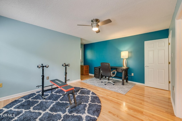 212 Old Castle Rd, Kingsport, TN 37660 - home office featuring wood finished floors, a ceiling fan, a textured ceiling, and baseboards