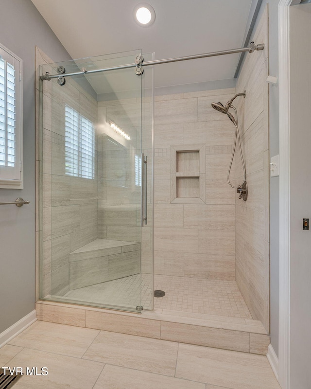 212 Old Castle Rd, Kingsport, TN 37660 - bathroom with a stall shower and baseboards