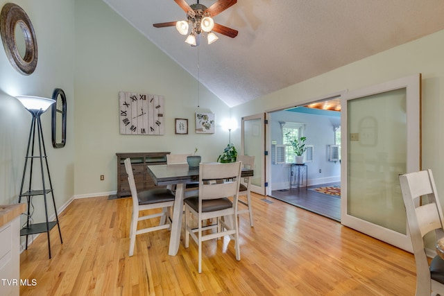 212 Old Castle Rd, Kingsport, TN 37660 - dining space featuring high vaulted ceiling, light wood finished floors, a ceiling fan, and baseboards