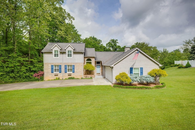 212 Old Castle Rd, Kingsport, TN 37660 - view of front of home with driveway, a front yard, a chimney, and an attached garage