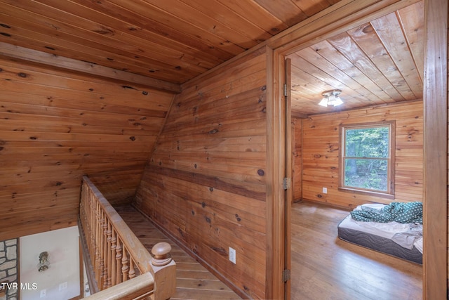 240 Old Railroad Grade Rd, Roan Mountain, TN 37687 - corridor with an upstairs landing, wooden ceiling, wood finished floors, and wooden walls
