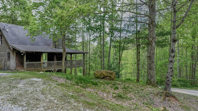 240 Old Railroad Grade Rd, Roan Mountain, TN 37687 - view of yard featuring a porch and a forest view