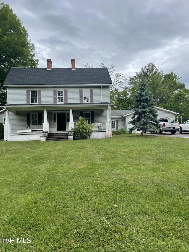 380 Oak Grove Rd, Johnson City, TN 37615 - view of front of property with a chimney, a porch, and a front yard