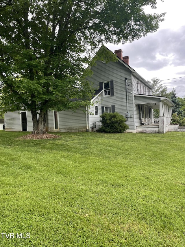 380 Oak Grove Rd, Johnson City, TN 37615 - rear view of house with a chimney and a yard