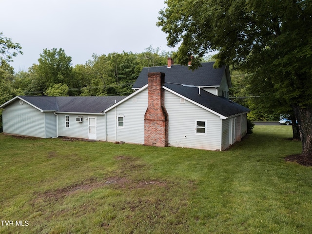 380 Oak Grove Rd, Johnson City, TN 37615 - rear view of property with a chimney, a yard, and roof with shingles