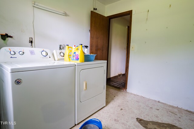 380 Oak Grove Rd, Johnson City, TN 37615 - washroom with washer and clothes dryer and light colored carpet