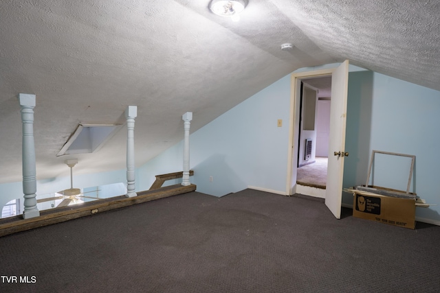 380 Oak Grove Rd, Johnson City, TN 37615 - bonus room with a textured ceiling, vaulted ceiling, carpet floors, and ceiling fan