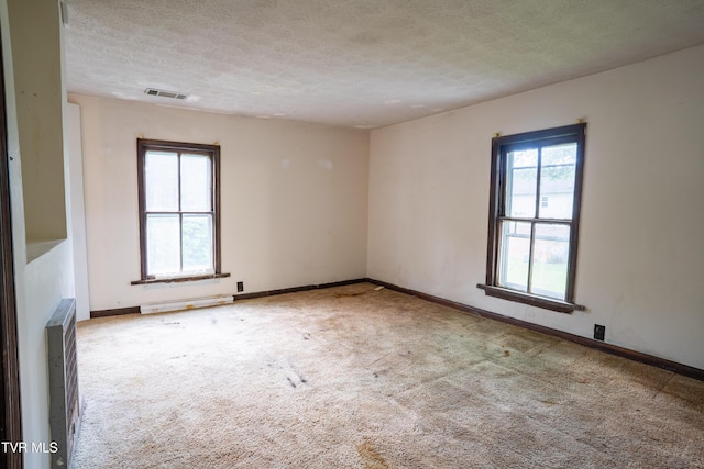 380 Oak Grove Rd, Johnson City, TN 37615 - unfurnished room featuring a textured ceiling, carpet floors, and baseboards