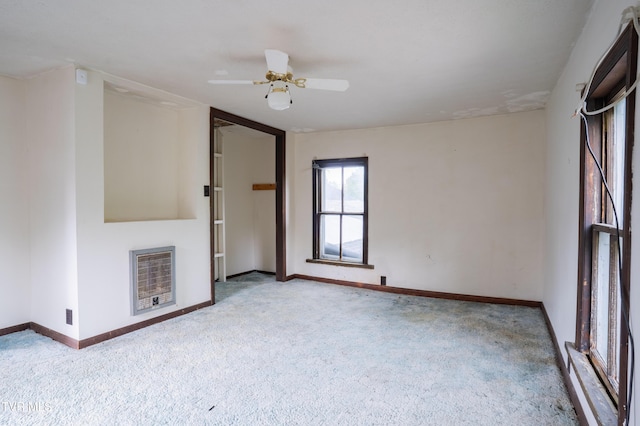 380 Oak Grove Rd, Johnson City, TN 37615 - unfurnished living room with carpet flooring, baseboards, ceiling fan, and heating unit