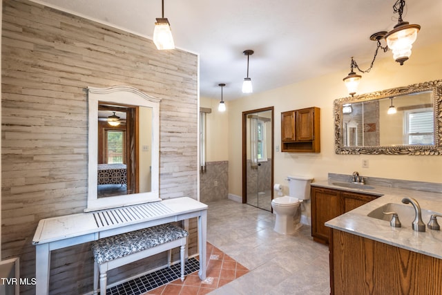 2480 Elk Way, Newport, TN 37821 - bathroom with wood walls, a walk in shower, vanity, toilet, and tile patterned flooring