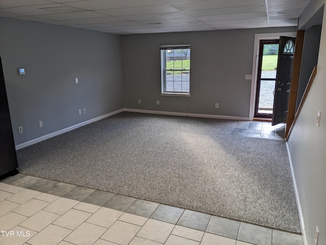 2482-2480 Elk Way, Newport, TN 37821 - empty room with light colored carpet, plenty of natural light, baseboards, a paneled ceiling, and light tile patterned floors