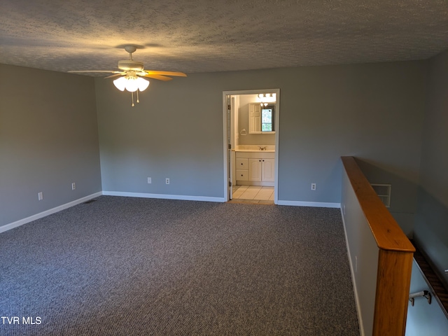 2482-2480 Elk Way, Newport, TN 37821 - spare room with ceiling fan, a textured ceiling, carpet floors, and baseboards