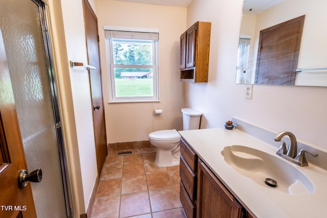 2482-2480 Elk Way, Newport, TN 37821 - bathroom featuring toilet, tile patterned floors, vanity, a shower with door, and baseboards