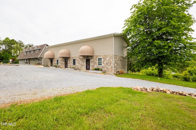 2482-2480 Elk Way, Newport, TN 37821 - view of front of home featuring stone siding and a front lawn