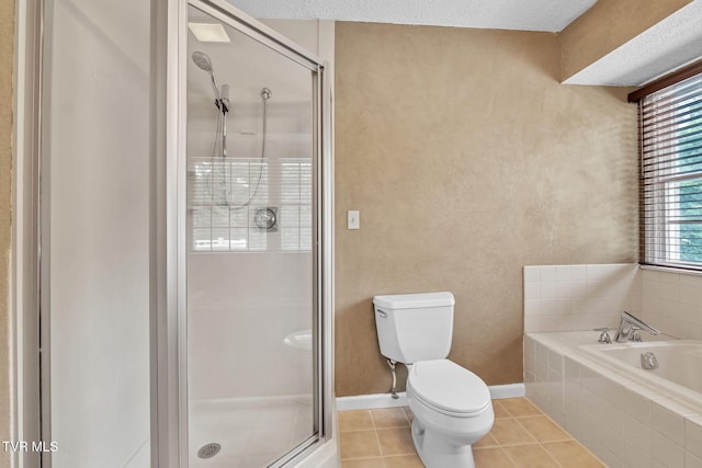 20111 Galen Dr, Abingdon, VA 24211 - full bath featuring a shower stall, toilet, a garden tub, and tile patterned flooring