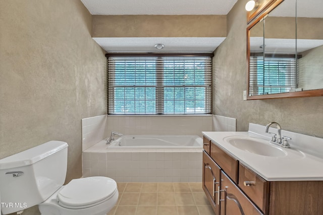 20111 Galen Dr, Abingdon, VA 24211 - bathroom featuring healthy amount of natural light, a bath, toilet, vanity, and a textured wall