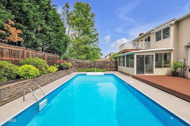 20111 Galen Dr, Abingdon, VA 24211 - view of pool featuring a sunroom, a fenced backyard, and a wooden deck