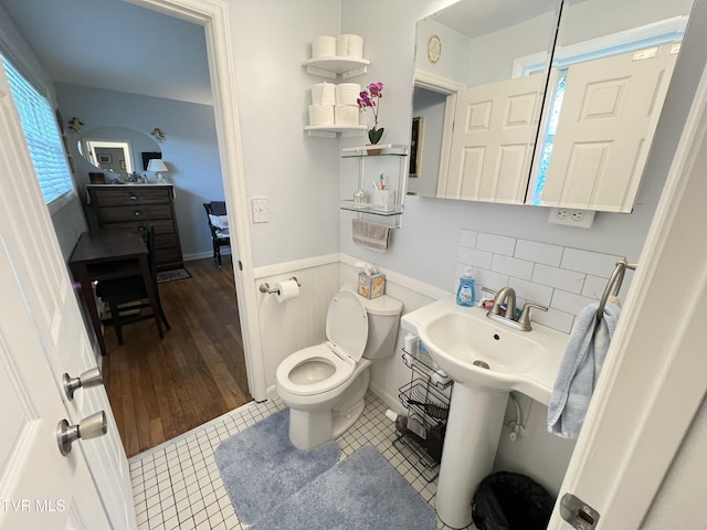 457 Devault St, Church Hill, TN 37642 - half bathroom featuring toilet, wainscoting, and tile patterned floors