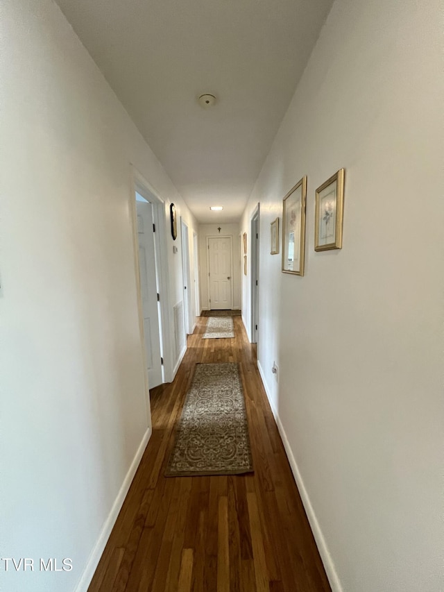 457 Devault St, Church Hill, TN 37642 - corridor featuring wood finished floors and baseboards