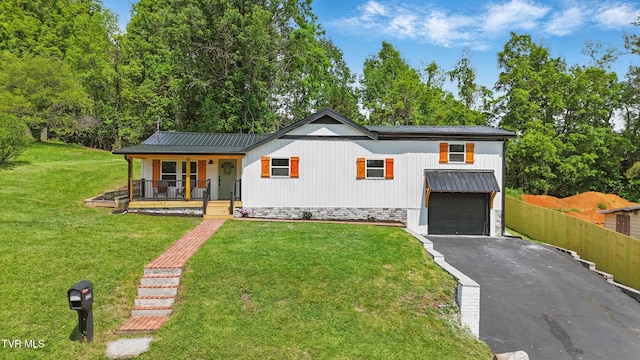1225 Bristol View Dr, Bristol, VA 24201 - modern farmhouse style home featuring a porch, driveway, metal roof, and a garage