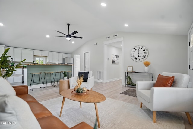 1225 Bristol View Dr, Bristol, VA 24201 - living room featuring light wood-style floors, lofted ceiling, a ceiling fan, recessed lighting, and baseboards