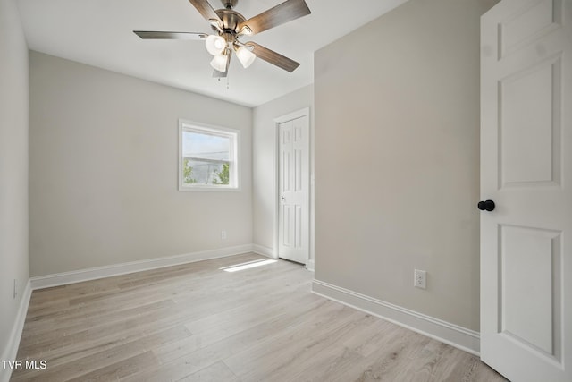 1225 Bristol View Dr, Bristol, VA 24201 - unfurnished bedroom with baseboards, light wood-style floors, a closet, and ceiling fan