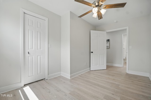 1225 Bristol View Dr, Bristol, VA 24201 - unfurnished bedroom with light wood finished floors, baseboards, a closet, vaulted ceiling, and a ceiling fan