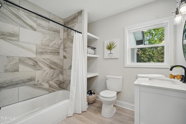 1225 Bristol View Dr, Bristol, VA 24201 - full bathroom with toilet, wood finished floors, shower / tub combo, baseboards, and vanity