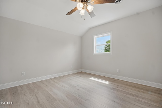 1225 Bristol View Dr, Bristol, VA 24201 - spare room featuring lofted ceiling, light wood finished floors, a ceiling fan, and baseboards