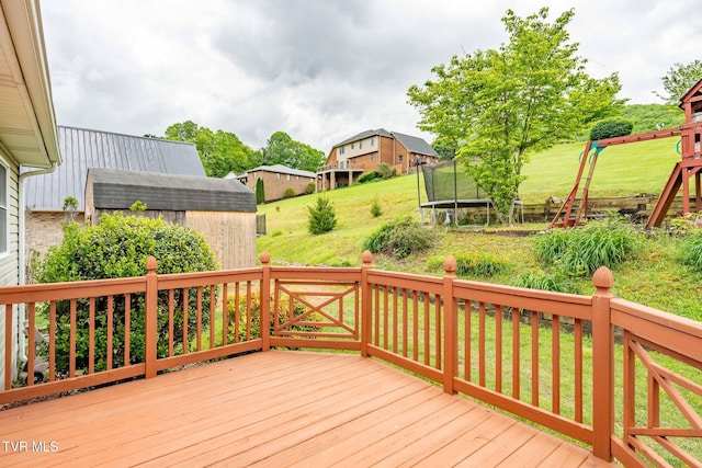 522 Crook St, Hampton, TN 37658 - wooden deck with a trampoline and a yard
