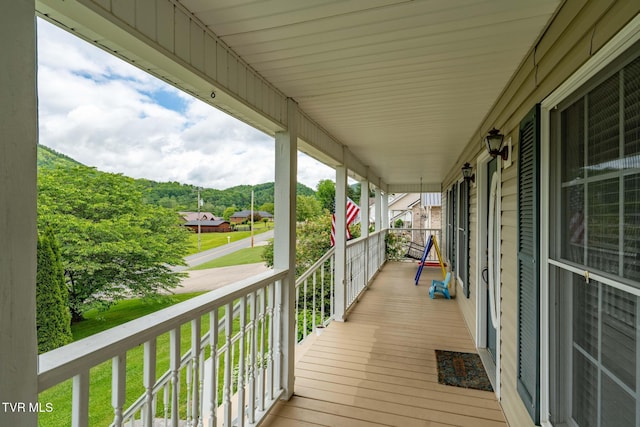 522 Crook St, Hampton, TN 37658 - deck featuring covered porch